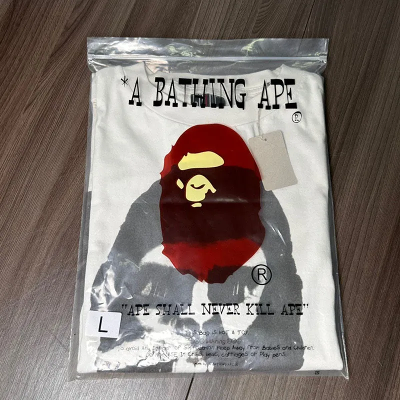 BAPE x Saint Mxxxxxx Skull Tee Vintage White