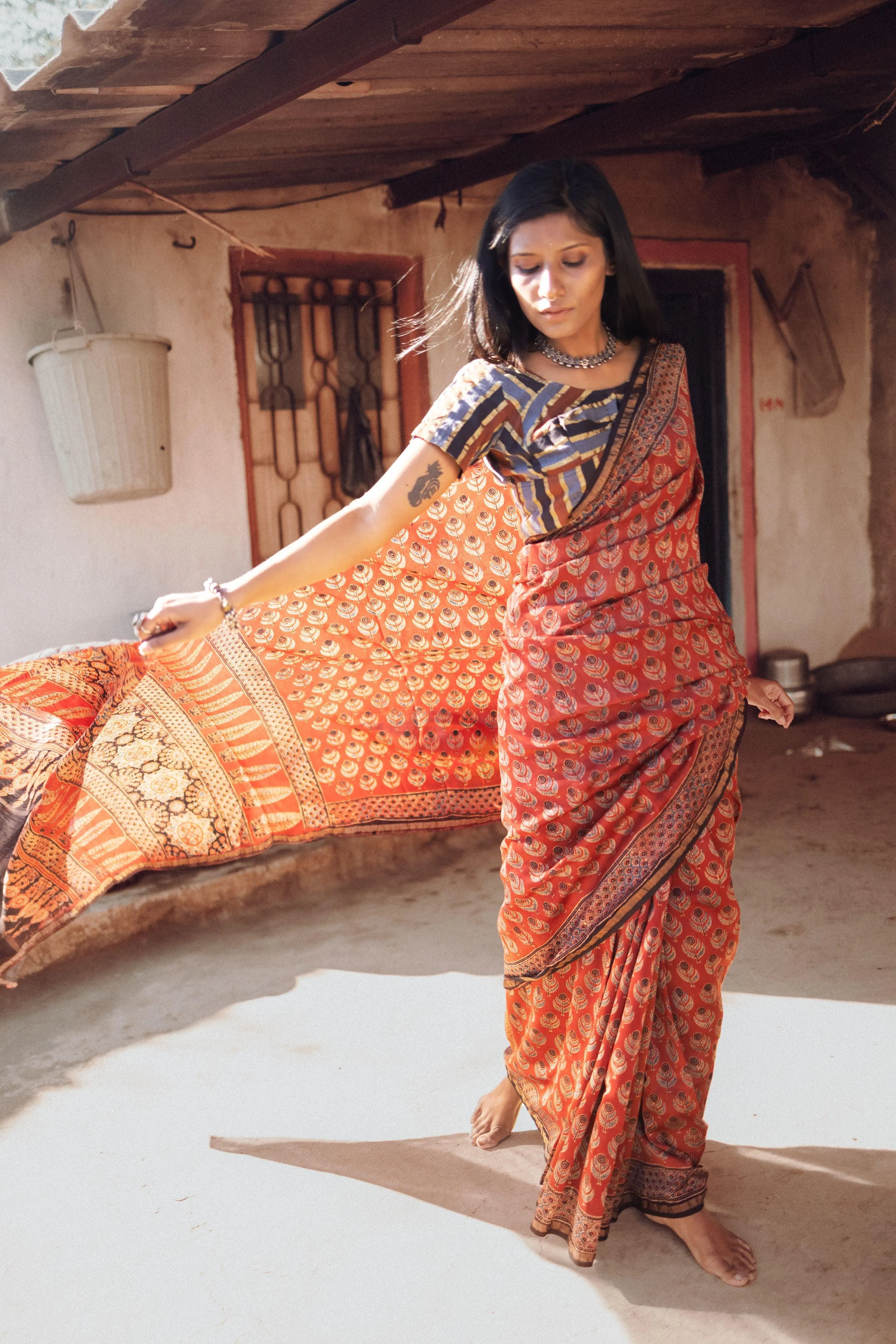 Jharokha -Red silk cotton Ajrakh handblockprinted saree