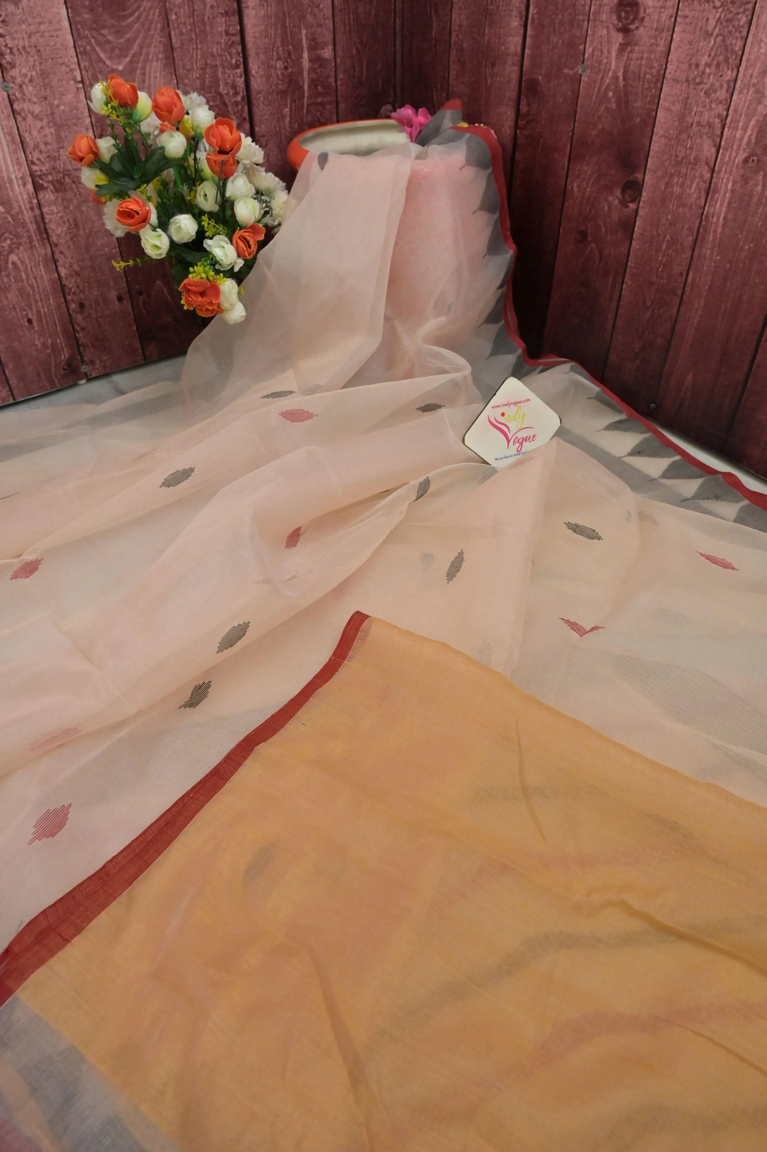 Offwhite Color Muslin Jamdani Saree with Temple Border